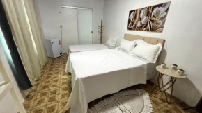 Quarto próximo ao Aeroporto Internacional